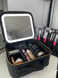 Trousse à maquillage avec miroir LED